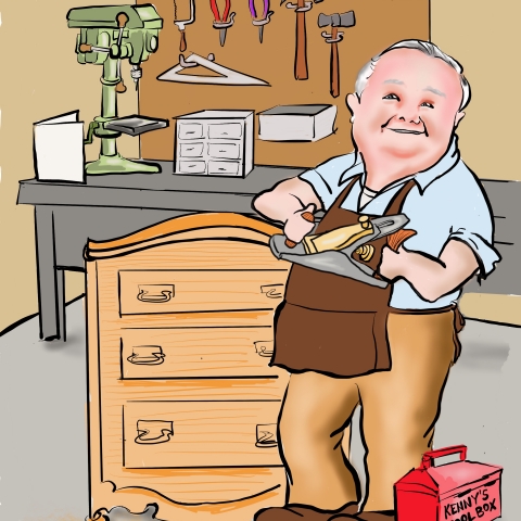 Kenny in his workshop holding a tool